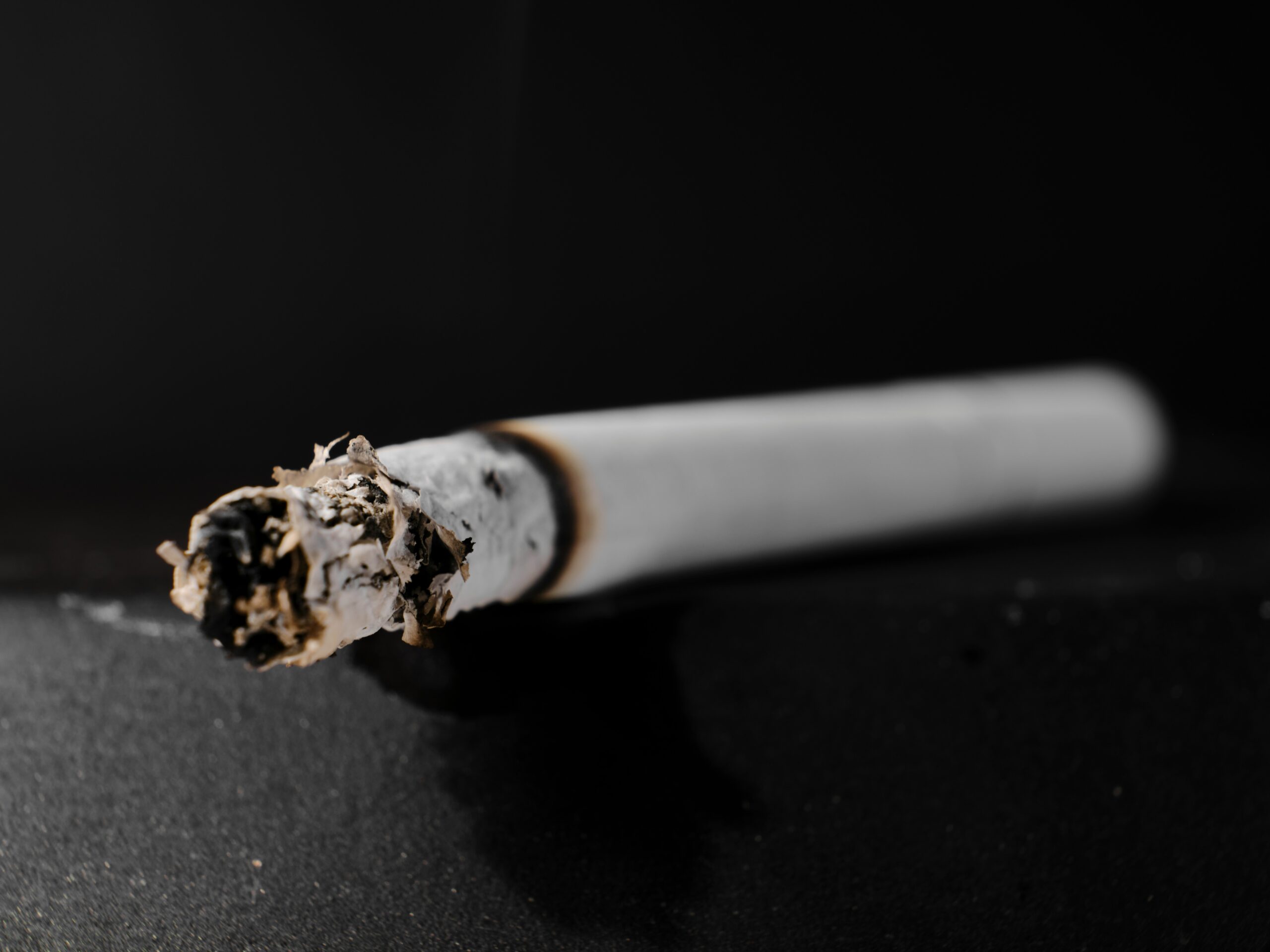 a close up of a cigarette on a table